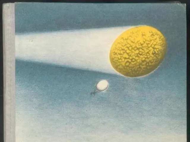 In this image we can see some pictures and text on a book which is placed on the surface.