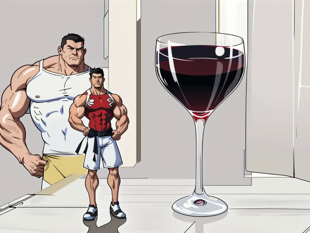 Red wine contained within a plastic cup, positioned on a countertop.